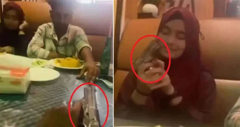 রেস্টুরেন্টে প্রেমিকার হাতে পিস্তল তুলে দিল প্রেমিক, ভিডিও ভাইরাল